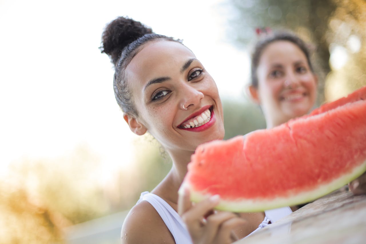 Siblings Holding A Watermelon